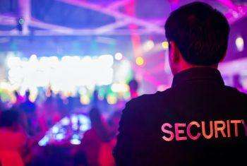 Professional security staff keeping the club entrance safe on Veronicas Strip.